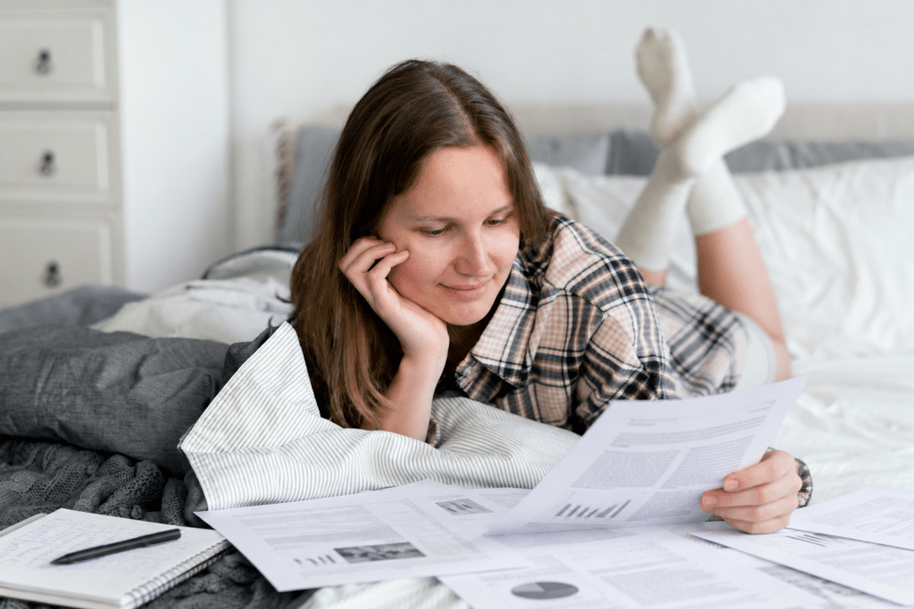 Young woman reviewing fertility clinic success rate statistics across Ohio Indiana and Kentucky on a tablet